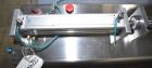 Used- Wenzhou Rigao Table Top Semi Automatic Piston Filler, Model DYF. 316L Stainless steel product contact. Filling speed 5...